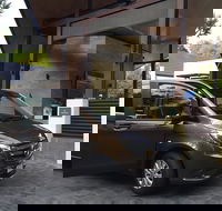 Mercedes 7 seat Limousine Cairns Airport to Port Douglas - Newcastle Accommodation