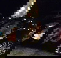 Jaguar Limousine Transfer Cairns Airport to Port Douglas - Newcastle Accommodation