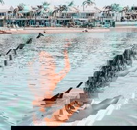 Stand up Paddle on the beautiful Noosa River with Hourly Board Hire - Newcastle Accommodation