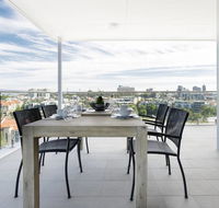 Minimalist Penthouse Condo with Skyline Vistas - Newcastle Accommodation