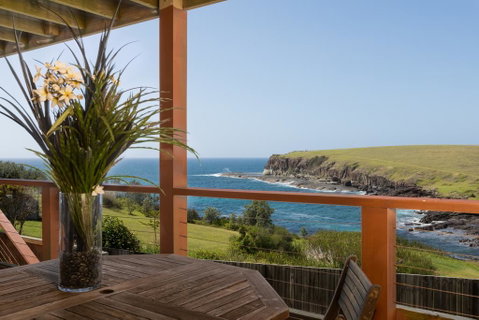 Absolute Oceanfront Cottage - Newcastle Accommodation 0