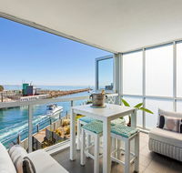 Azure Bliss Family escape opposite beach with heated pool access - Newcastle Accommodation