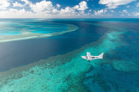 Great Barrier Reef Scenic Flight And Ocean Rafting Whitehaven Beach Day Trip - Newcastle Accommodation 3